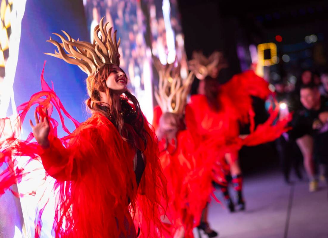 Costumed performers dance during the second night of the Electric Daisy Carnival at Las Vegas M ...
