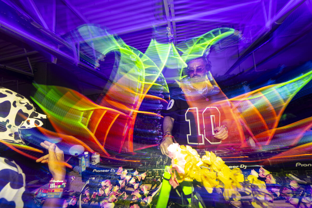 DJ Tripps performs at the Blacklight Bar during the final night of the Electric Daisy Carnival ...