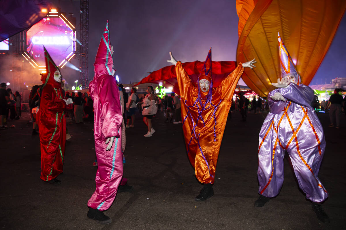 Costumed performers dance during the second night of the Electric Daisy Carnival at Las Vegas M ...