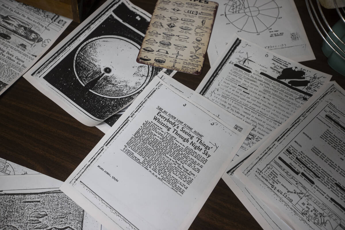 Newspaper clippings and other documents are seen on display at the Outpost 51 Alien Museum on T ...
