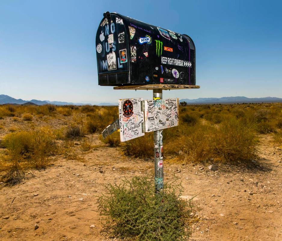 The famed Black Mailbox sits on the side of the road outside of Rachel and is still chock full ...