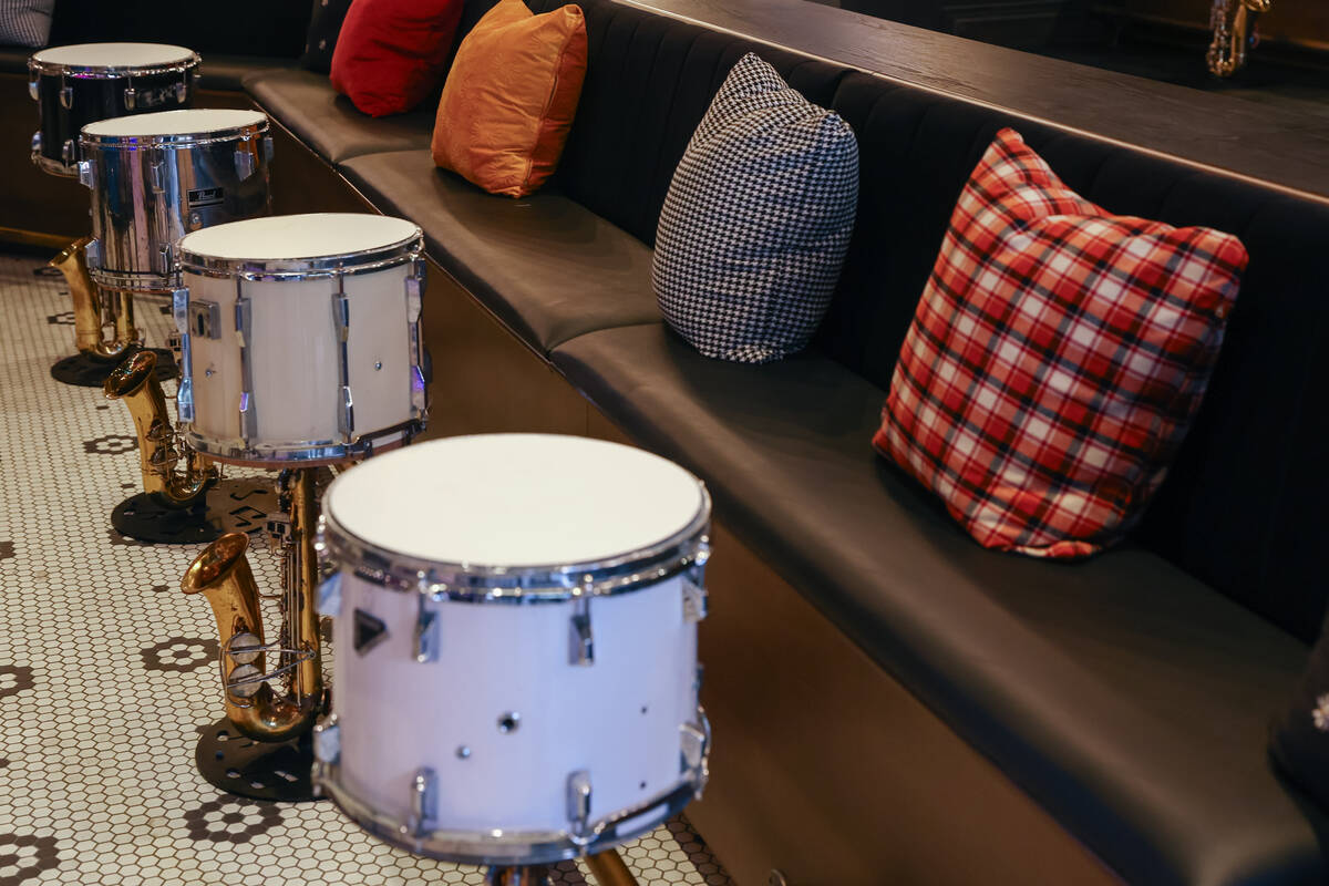 Tables made of drums and saxophones decorate the lounge of Smelly Cat, a new karaoke bar openin ...