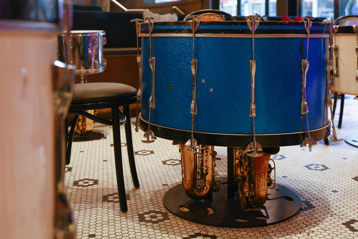 Tables made of drums and saxophones decorate the lounge of Smelly Cat, a new karaoke bar openin ...