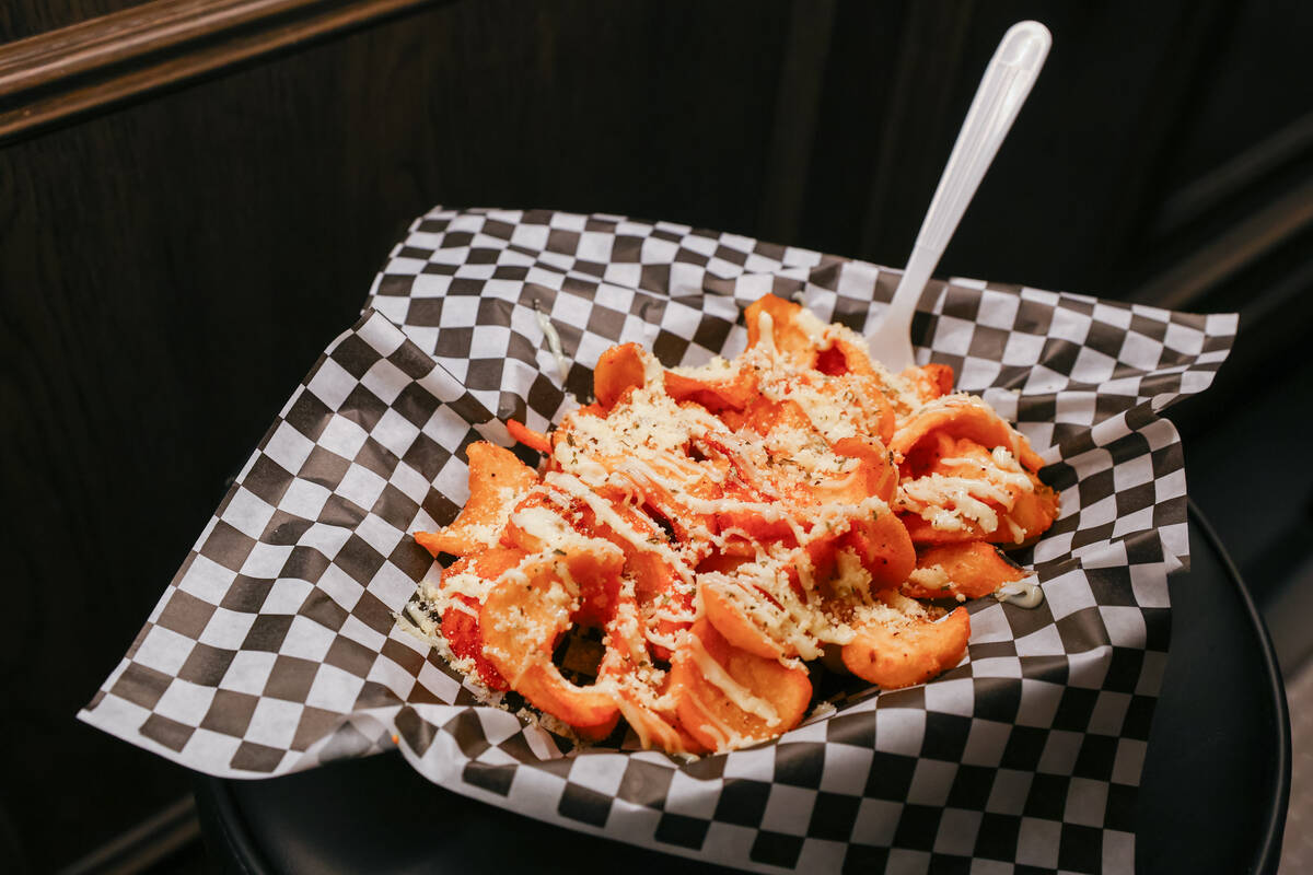 The truffle fries, with parmesan, fresh herbs an truffle aioli, at Smelly Cat, a new karaoke ba ...