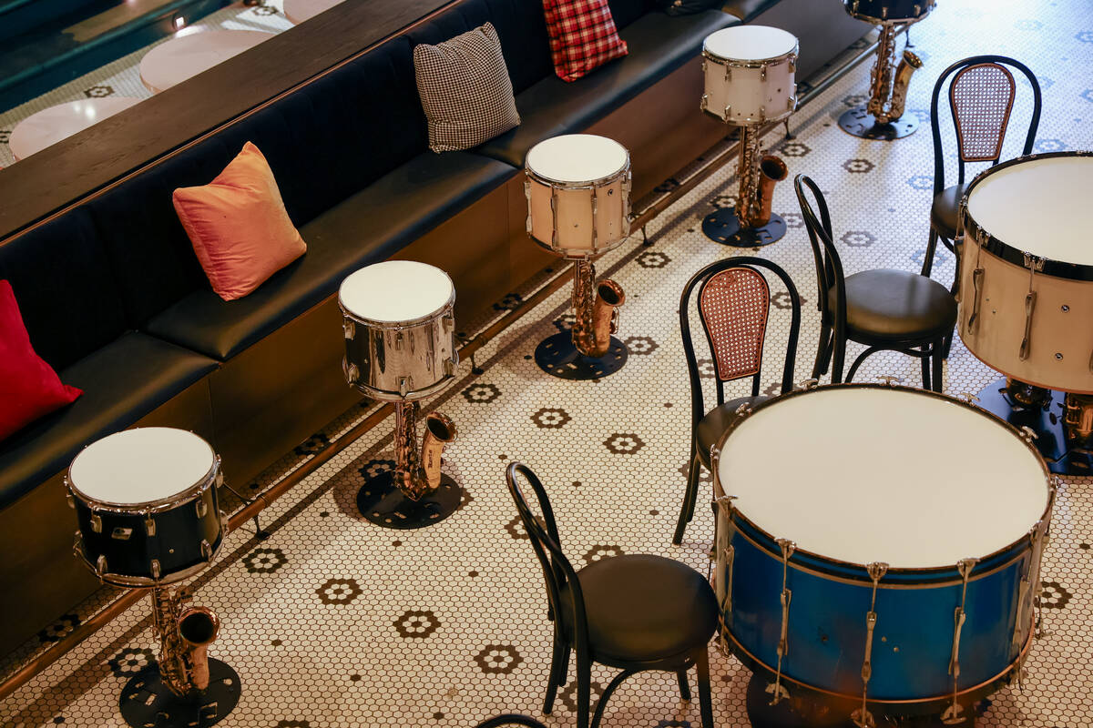 Tables made of drums and saxophones decorate the lounge of Smelly Cat, a new karaoke bar openin ...