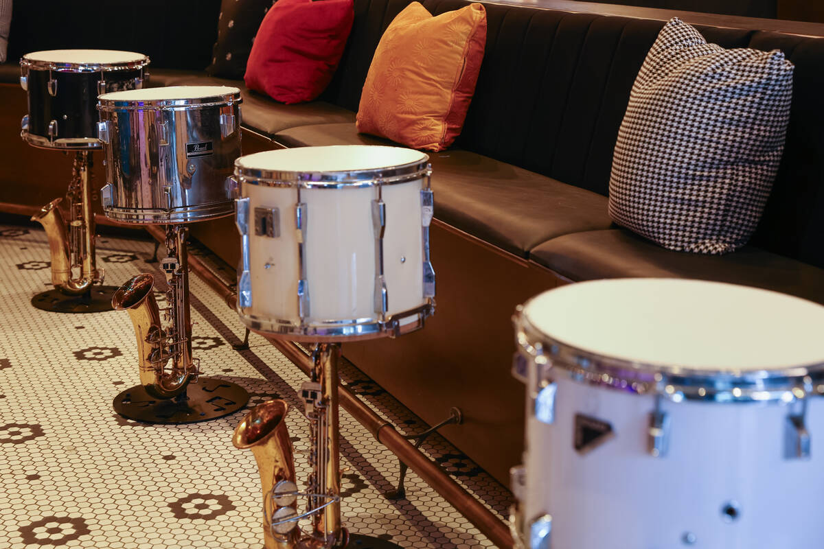 Tables made of drums and saxophones decorate the lounge of Smelly Cat, a new karaoke bar openin ...