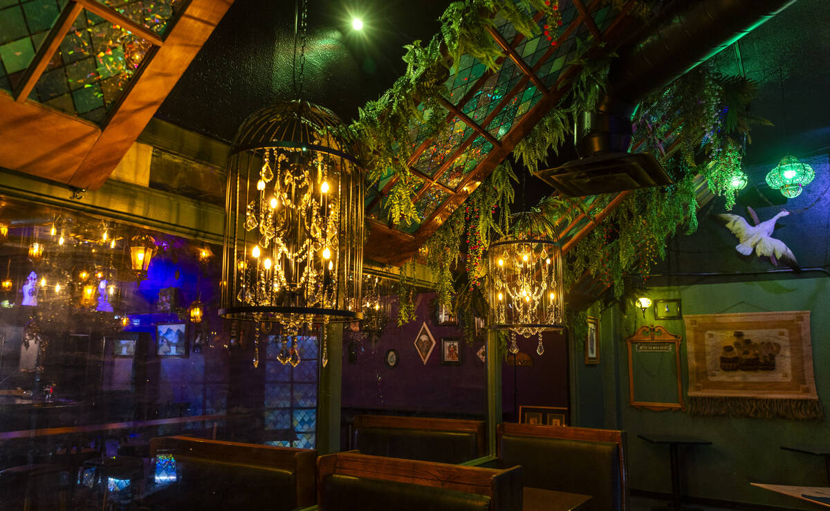 Dramatic lighting and funky art are a focus of the new Grey Witch bar and restaurant on Thursda ...