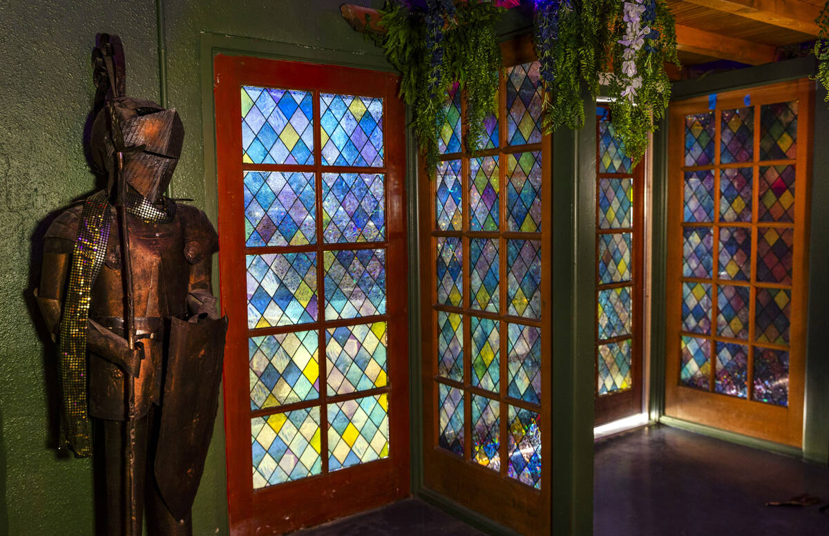 A suit of armor stands beside the interior entrance at the new Grey Witch bar and restaurant on ...