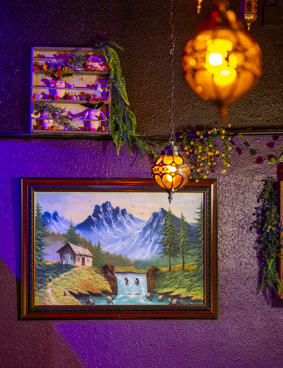 Dramatic lighting and funky art are a focus of the new Grey Witch bar and restaurant on Thursda ...