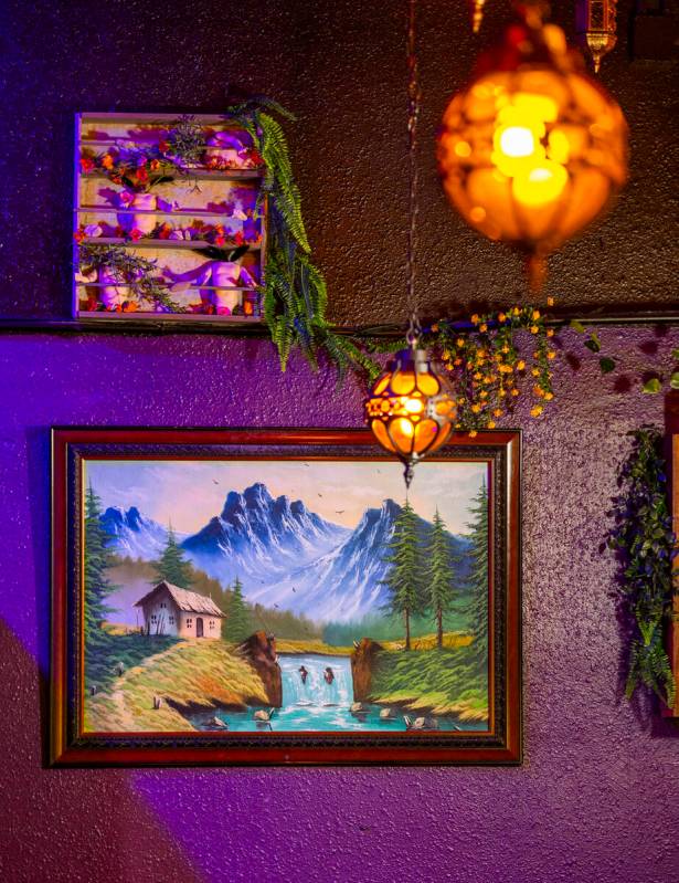 Dramatic lighting and funky art are a focus of the new Grey Witch bar and restaurant on Thursda ...