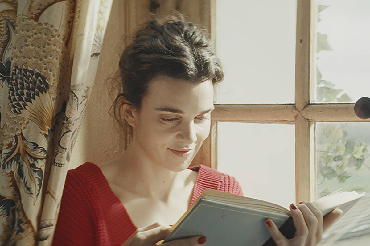 This image shows Camille Rutherford in a still from the film "Jane Austen Wrecked My Life. ...