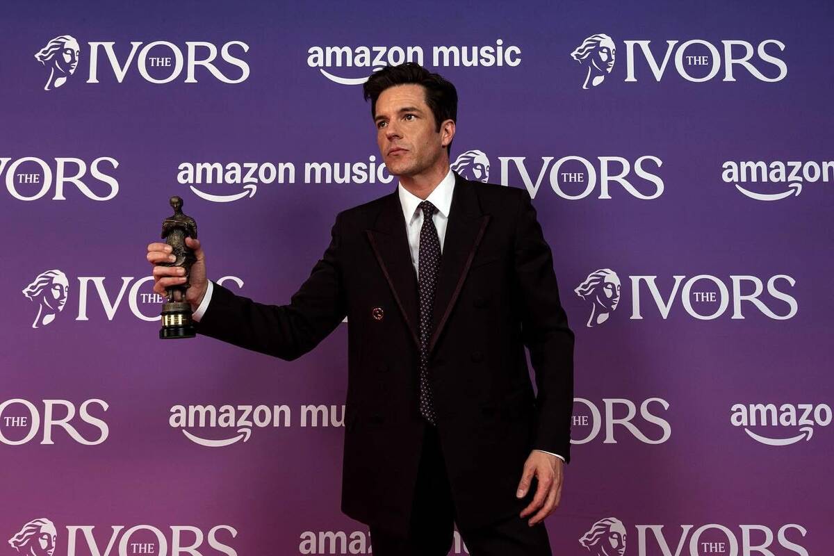 Brandon Blowers of the the Killers is shown with his Special International Award at the 2025 Iv ...