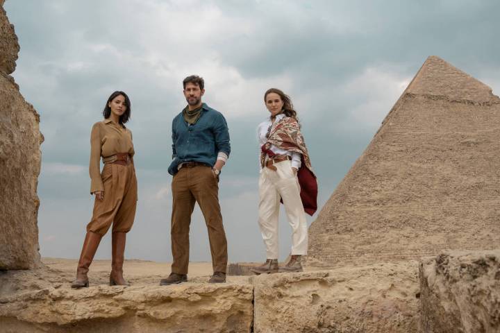 From left, Eiza González, John Krasinski and Natalie Portman in “Fountain of Youth.” (Dan ...