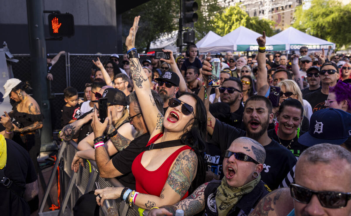 Fans cheer as Youth Brigade performs during the first day of the Punk Rock Bowling music festiv ...