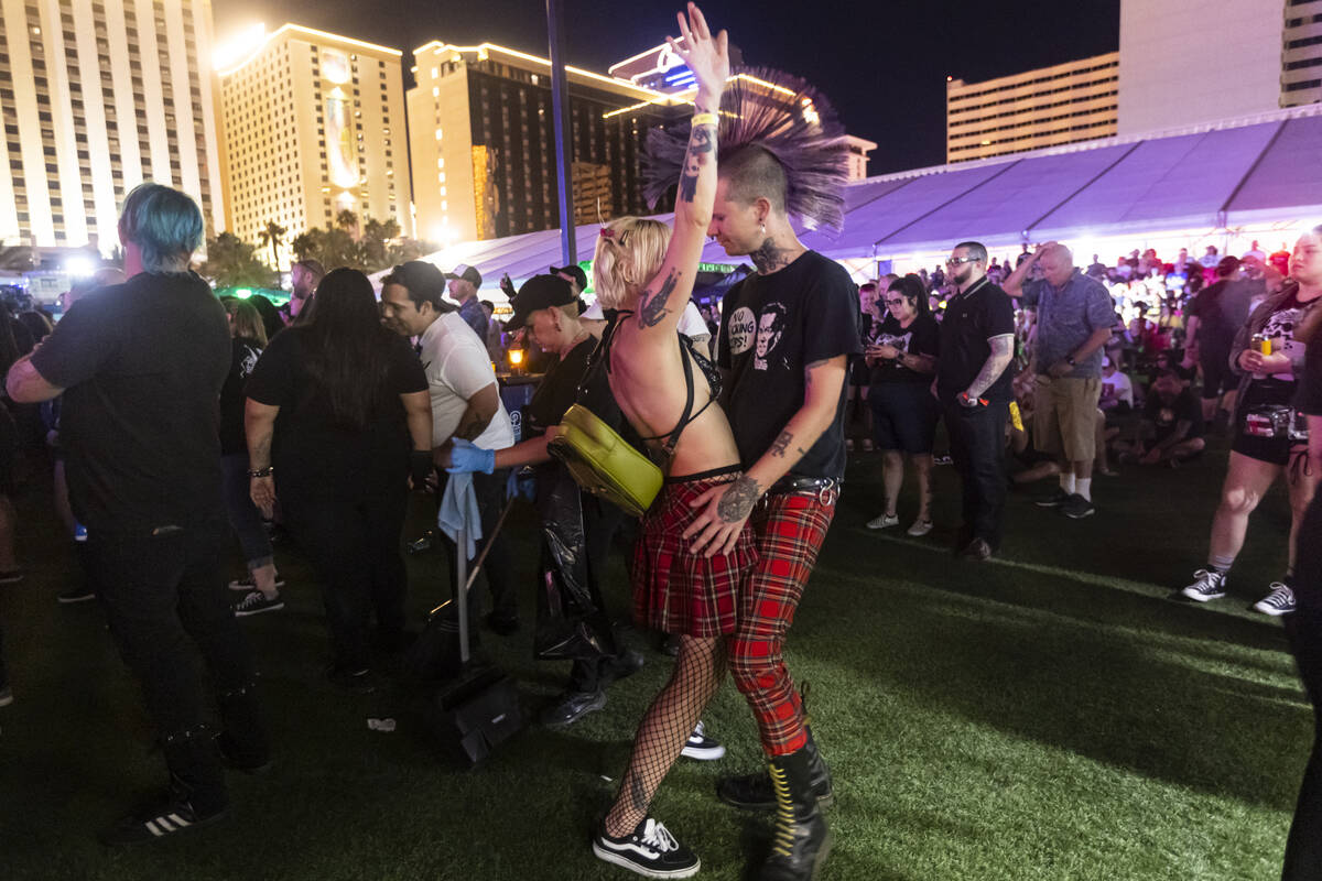 Attendees dance as Cock Sparrer performs during the first day of the Punk Rock Bowling music fe ...