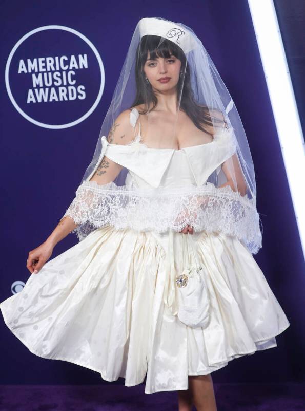 Rebecca Black walks the red carpet for the American Music Awards at Fontainebleau on Monday, Ma ...