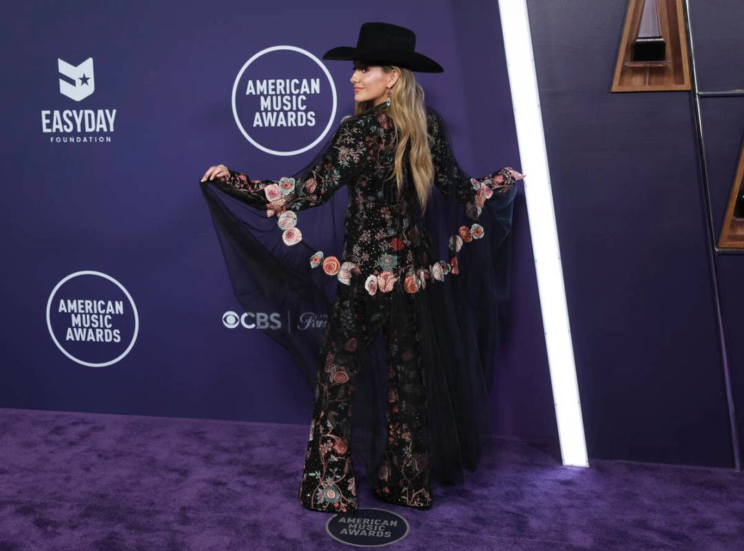 Lainey Wilson poses on the red carpet for the American Music Awards at Fontainebleau on Monday, ...