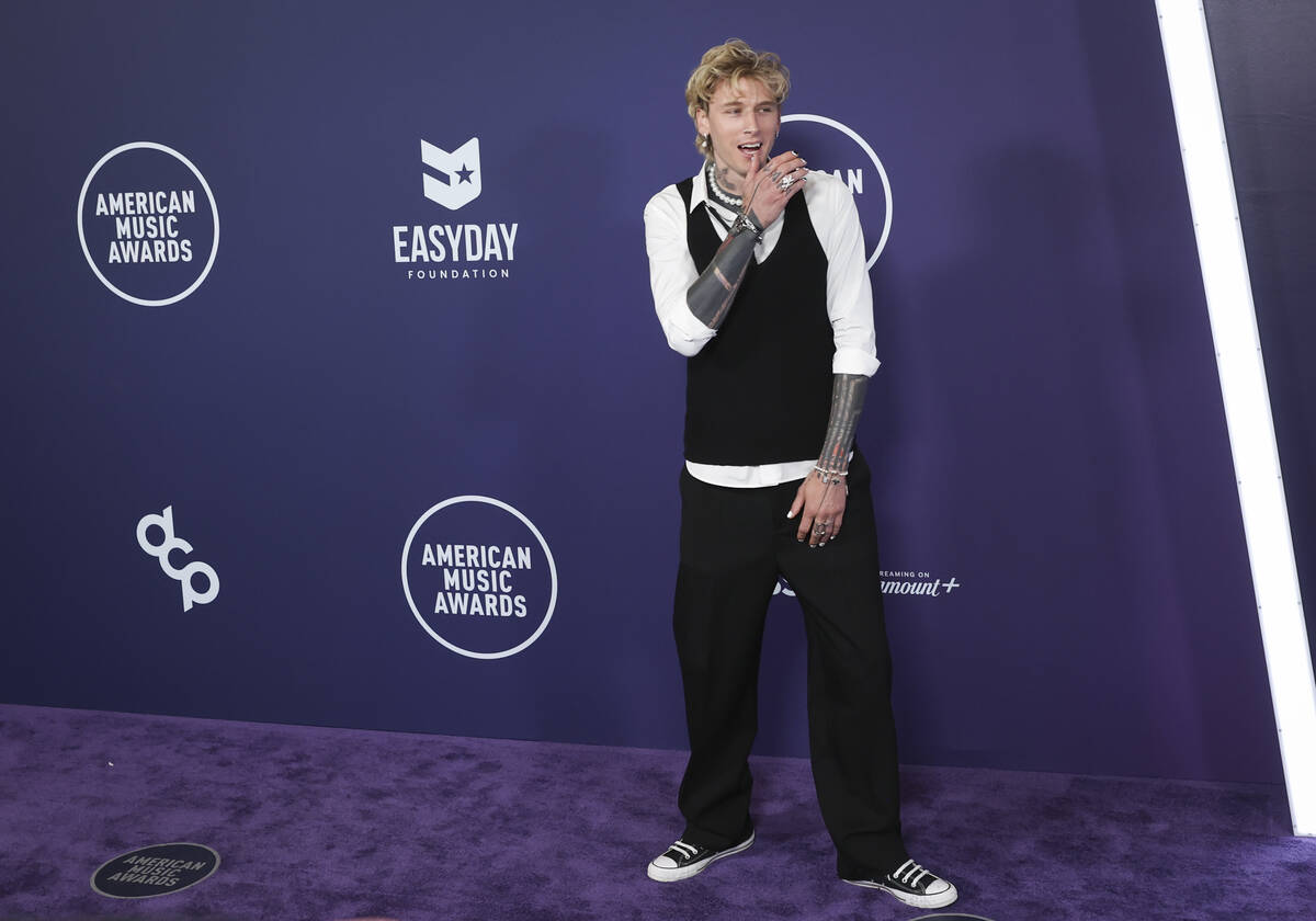 mgk, formerly Machine Gun Kelly, walks the red carpet for the American Music Awards at Fontaine ...