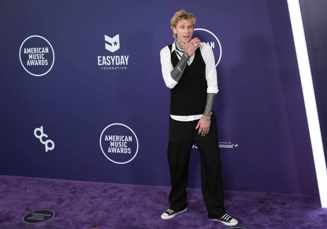 mgk, formerly Machine Gun Kelly, walks the red carpet for the American Music Awards at Fontaine ...