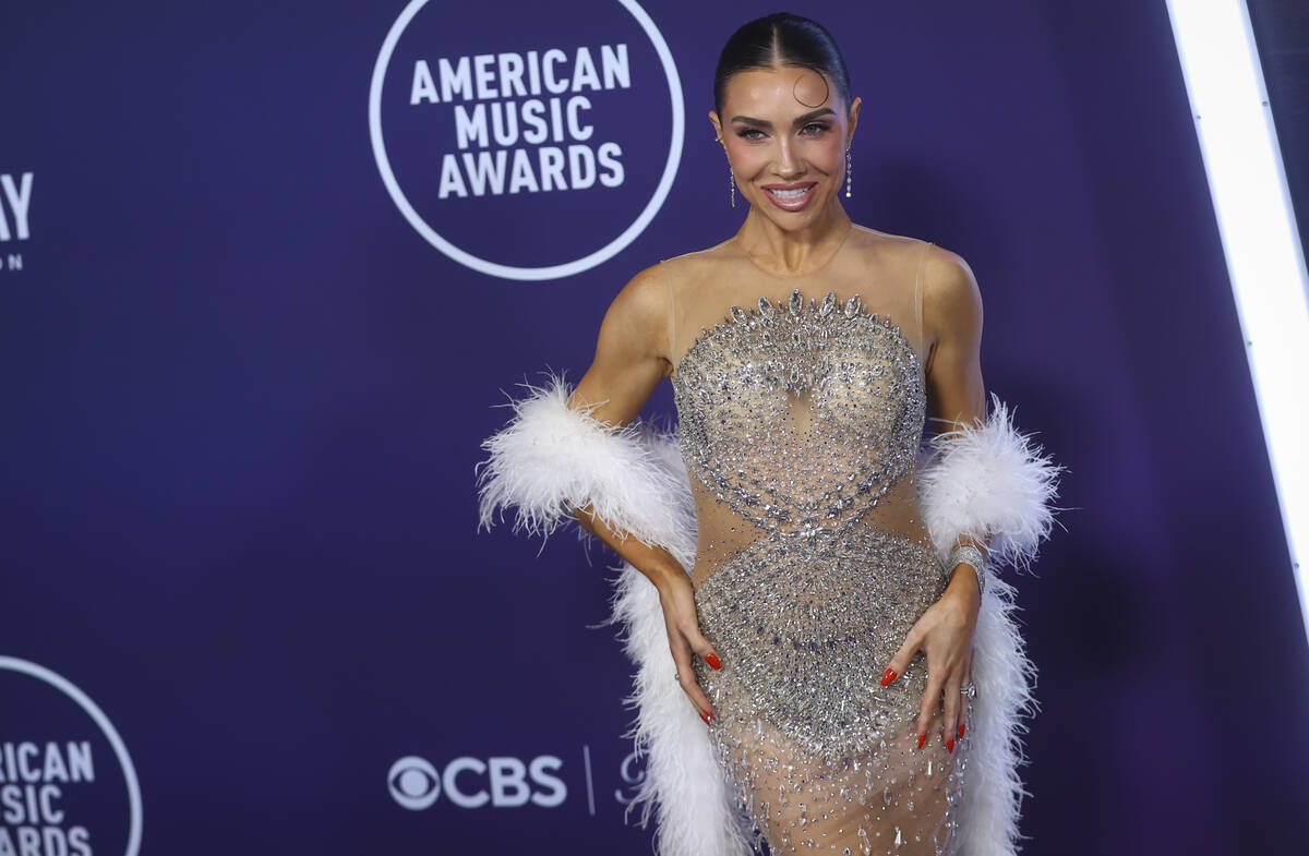 Jenna Johnson poses on the red carpet for the American Music Awards at Fontainebleau on Monday, ...