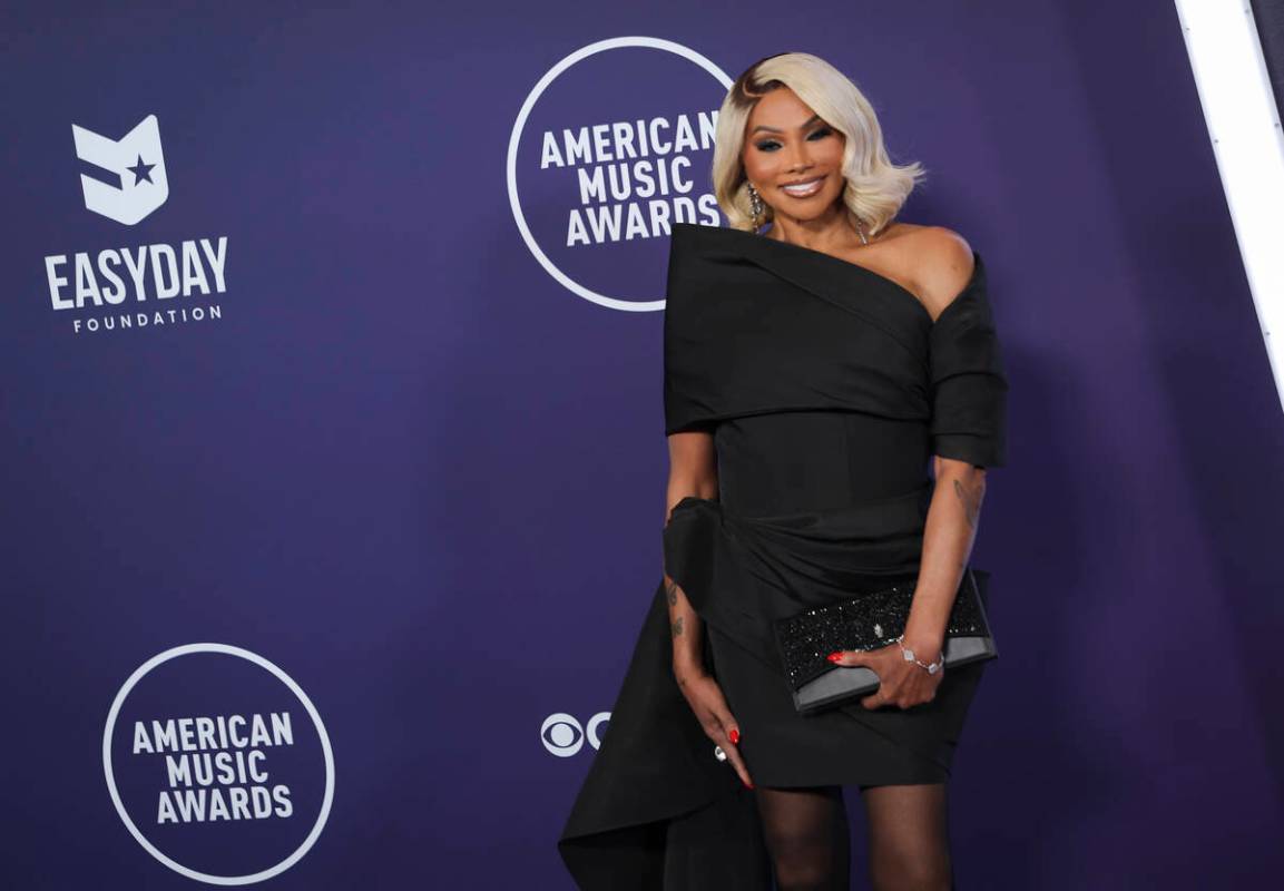 Pepa of Salt-N-Pepa poses on the red carpet for the American Music Awards at Fontainebleau on M ...