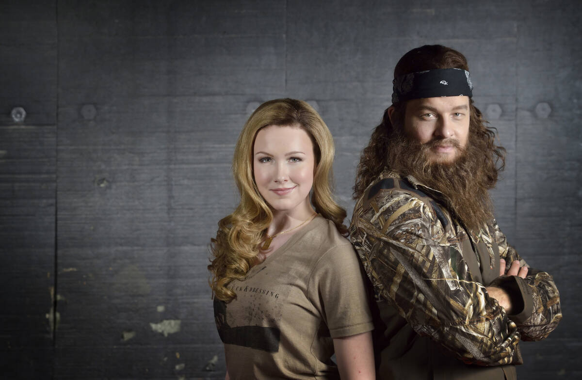 Ginna Claire Mason, left, and Ben Thompson are shown in a rehearsal space for "Duck Commander M ...