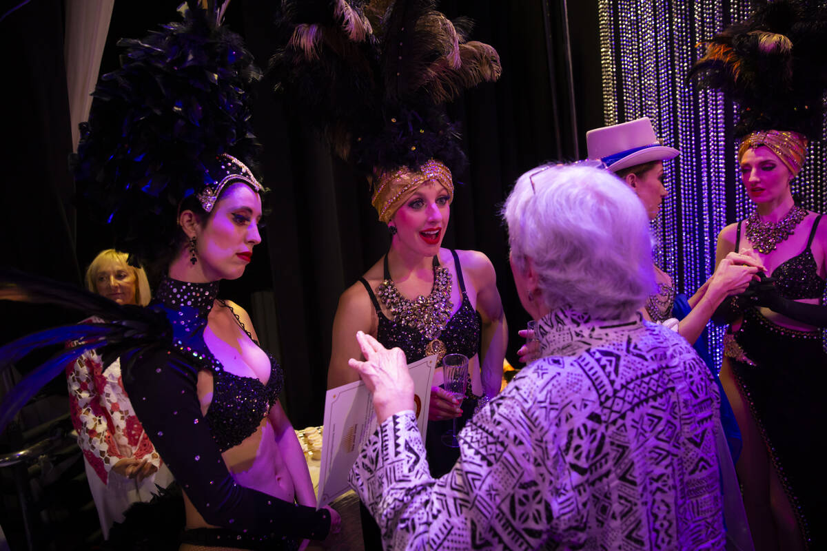 Las Vegas showgirls of past and present mingle during an event to celebrate the first ever Nati ...