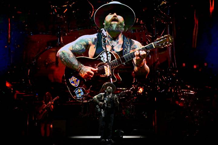 Zac Brown, center, performs with members of the Zac Brown Band during a concert Saturday Aug. 5 ...