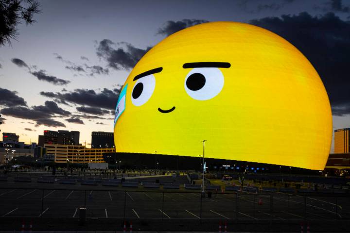 Orbi, the recently revealed name of the Sphere emoji, looks around Las Vegas. (Chase Stevens/La ...