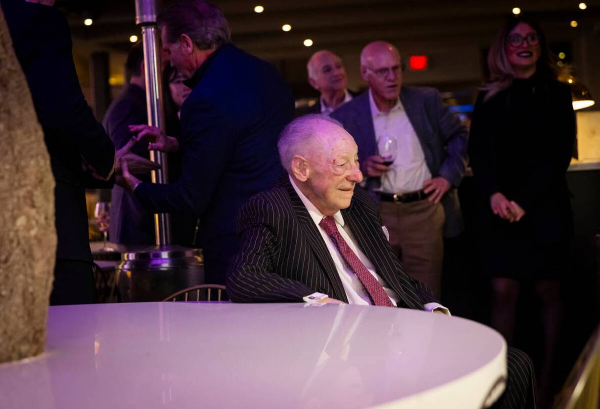 Former Las Vegas Mayor Oscar Goodman looks at a newly created mural of himself with wife and fo ...