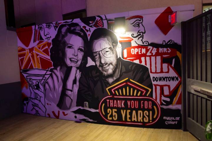 A mural of former Las Vegas Mayors Carolyn and Oscar Goodman before an "Oscar's DInner&quo ...
