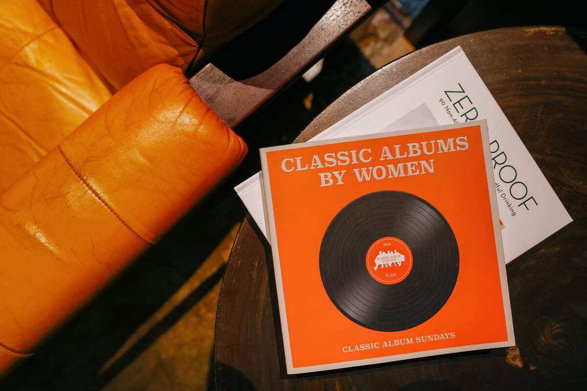Books sit stacked on a side table at Echo Sound and Taste, a new restaurant and music lounge in ...