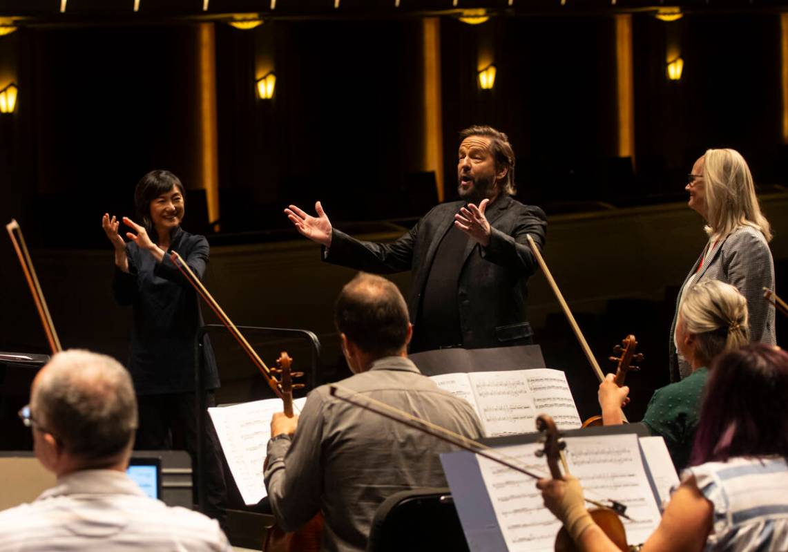 Ventriloquist Terry Fator speaks with members of the Las Vegas Philharmonic alongside executive ...