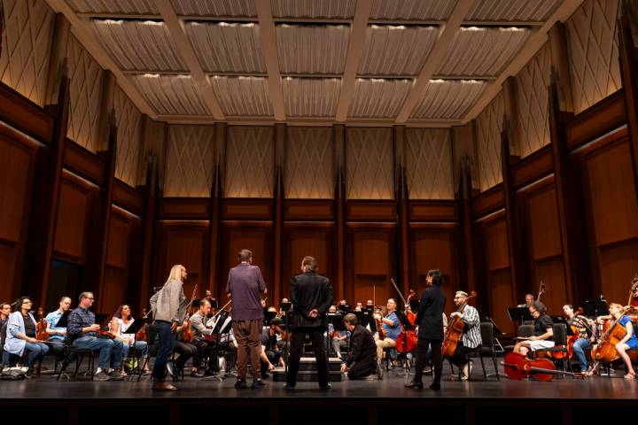 Ventriloquist Terry Fator, center, listens to a rehearsal of the Las Vegas Philharmonic at Reyn ...