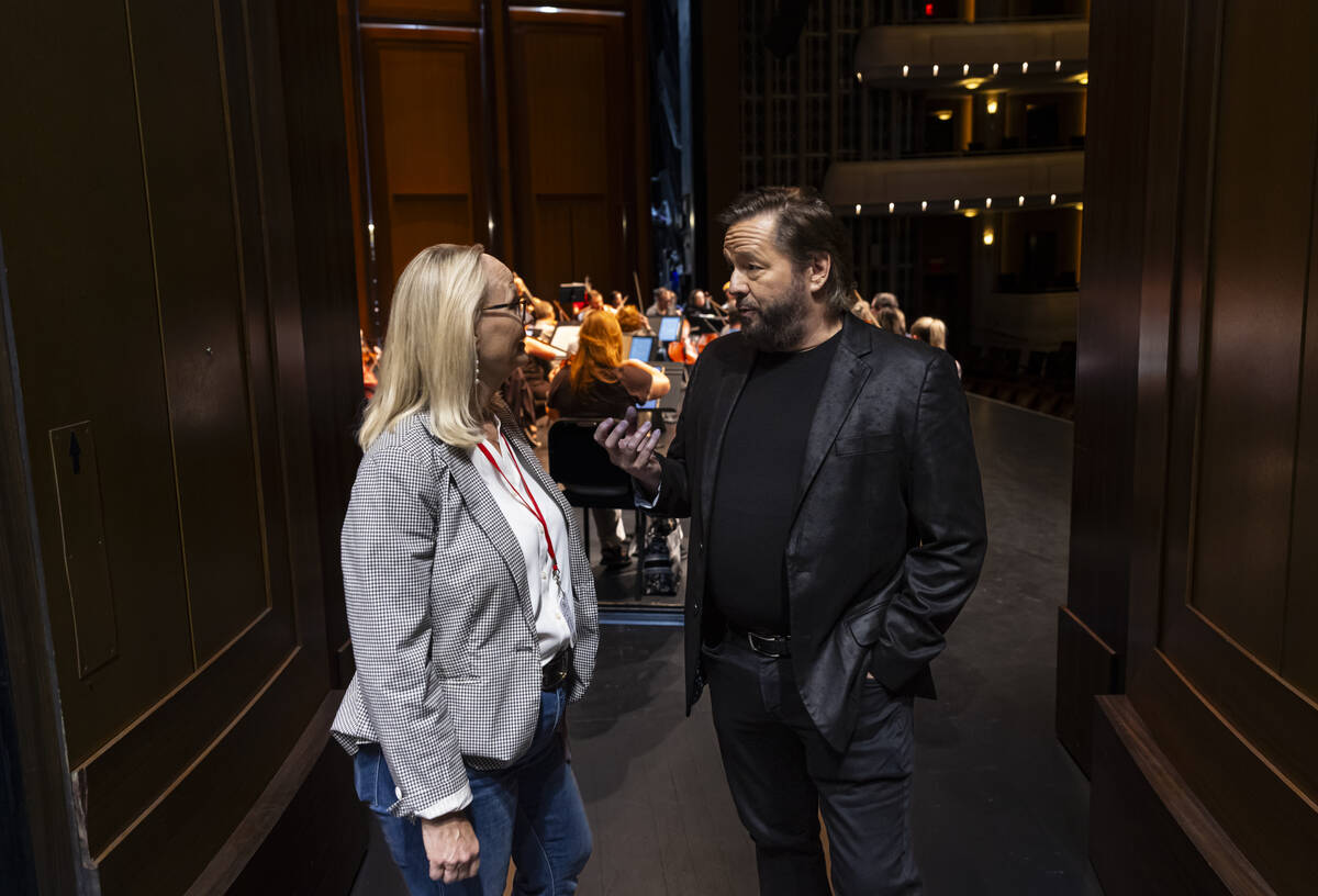 Alice Sauro, Executive Director of the Las Vegas Philharmonic, left, talks with ventriloquist T ...
