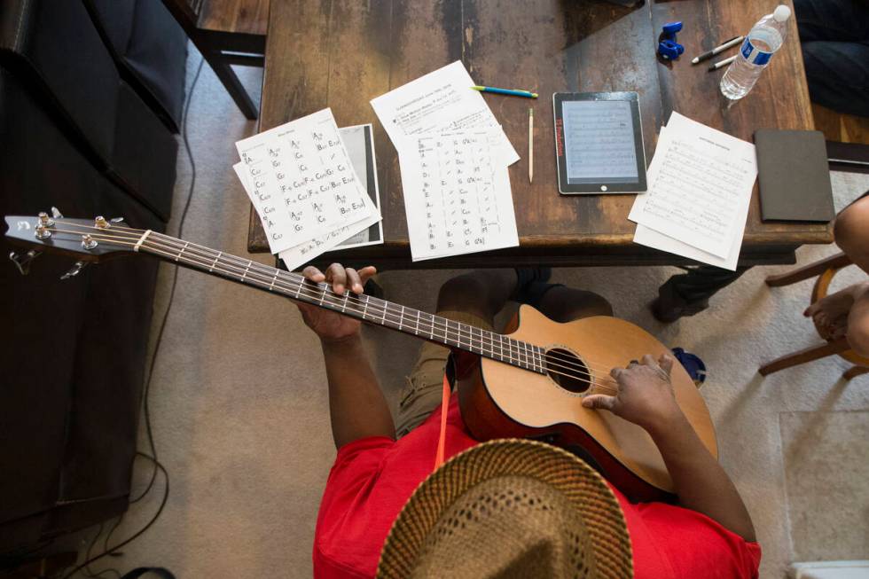 Tony Smith, member of the gypsy jazz band the Hot Club of Vegas, rehearses on Thursday, June 9, ...