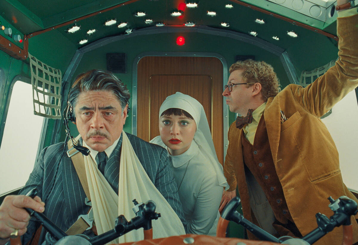 This image released by Focus Features shows Benicio del Toro, left, Mia Threapleton, center, an ...