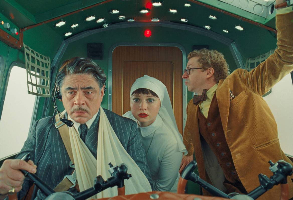 This image released by Focus Features shows Benicio del Toro, left, Mia Threapleton, center, an ...