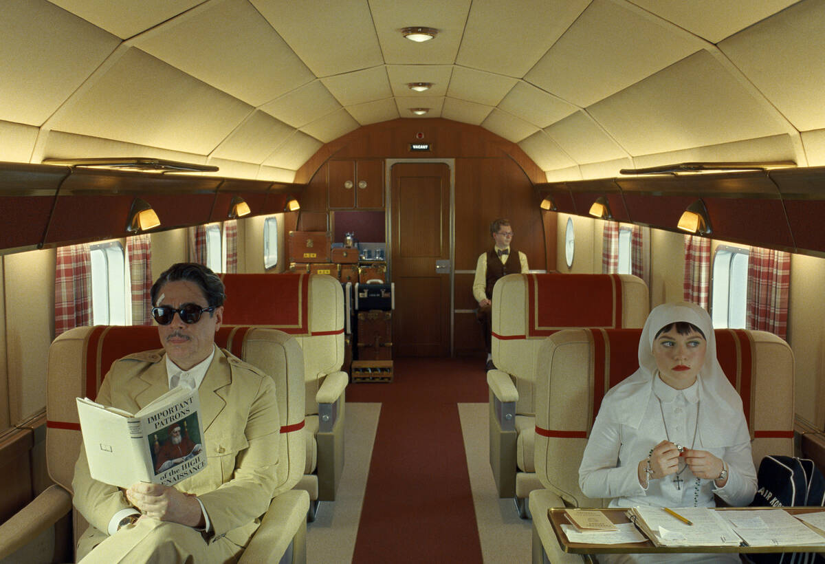 This image released by Focus Features shows, from left, Benicio Del Toro, Michael Cera and Mia ...