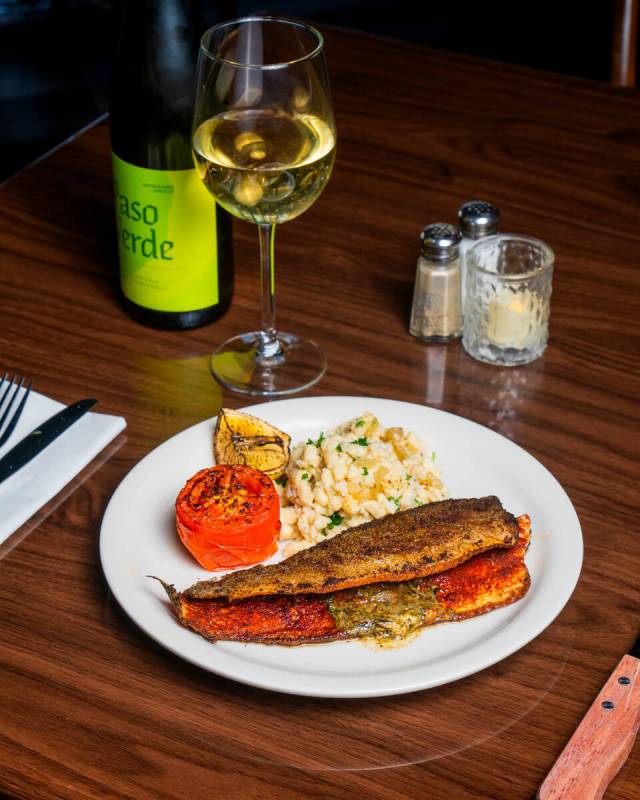 Blackened Idaho rainbow trout from the dinner menu introduced in late spring 2025 at Winnie & E ...