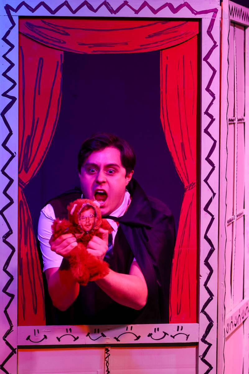 Jeffery DuBey, playing Ezra Lamb, monologues with a puppet featuring a photo of Jeffrey Dahmer ...