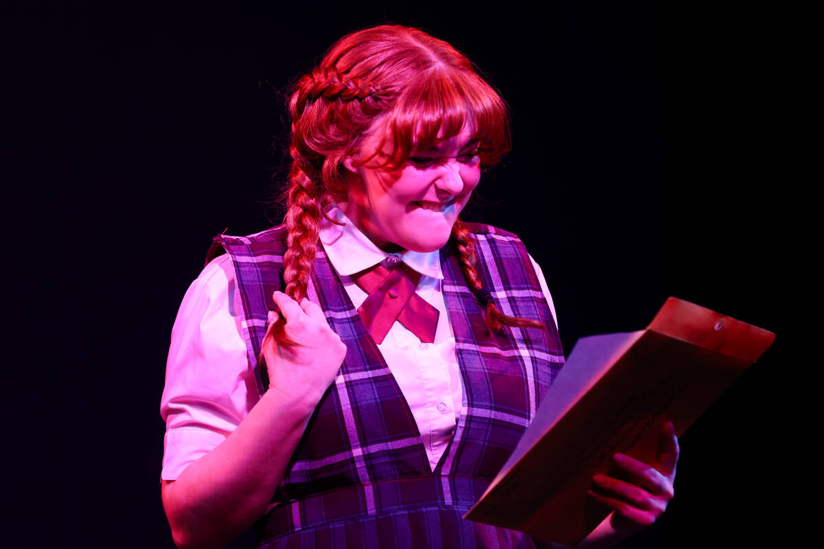 Emma Newton, playing Penny Lamb, reads a letter sent to Penny by her idol, Johnny Moon, during ...