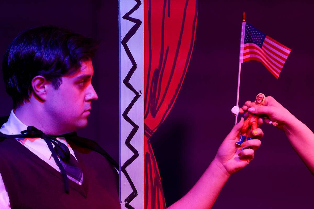 Jeffery DuBey, playing Ezra Lamb, holds a figurine representing a U.S. border patrol agent duri ...