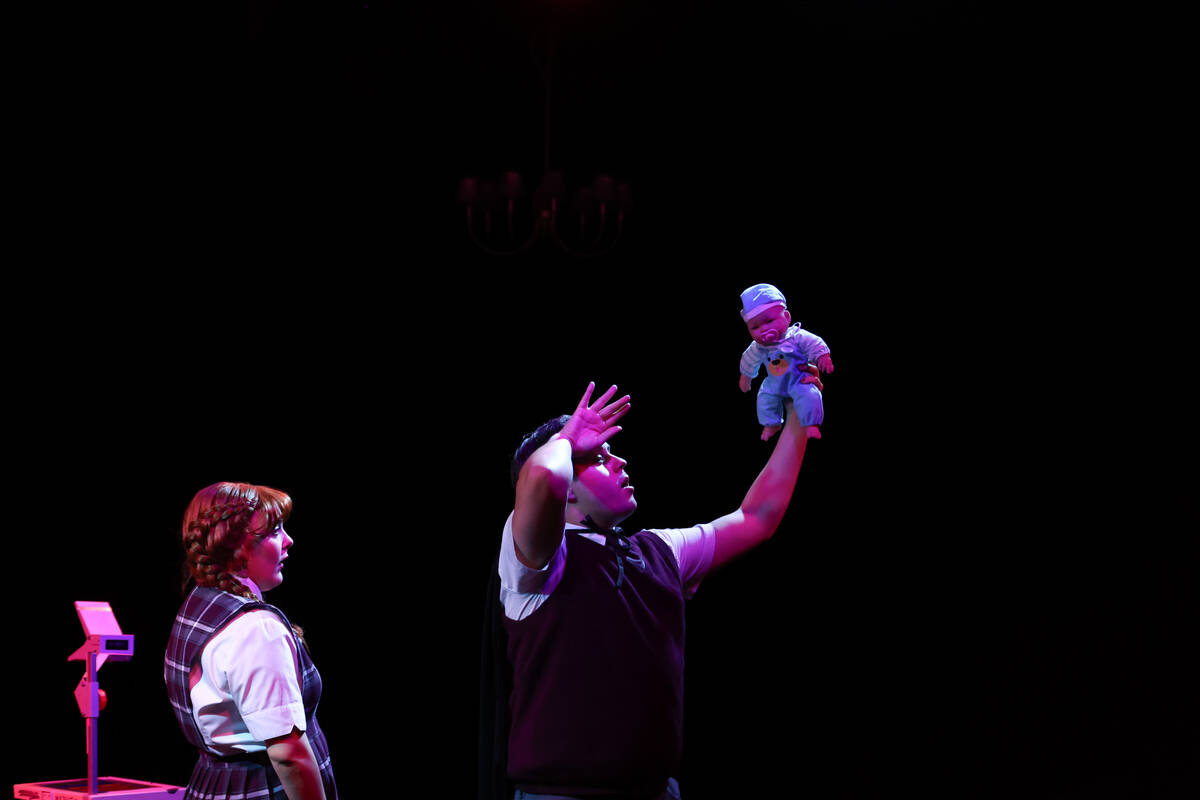 Jeffery DuBey, playing Ezra Lamb, holds up a prop meant to represent the bouncer of a club as h ...