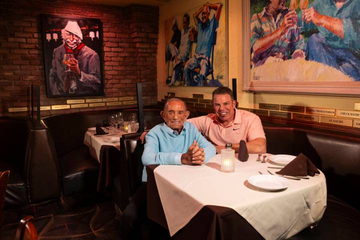 Freddie Glusman, left, poses for a portrait with Steven Siegel of The Siegel Group at Piero's I ...