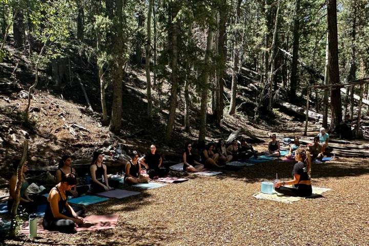 An outdoor yoga class is held at Lee Canyon, northwest of the Las Vegas Valley. Through the sum ...