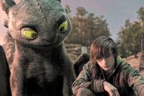 This image released by Universal Pictures shows Mason Thames in a scene from "How to Train Your ...