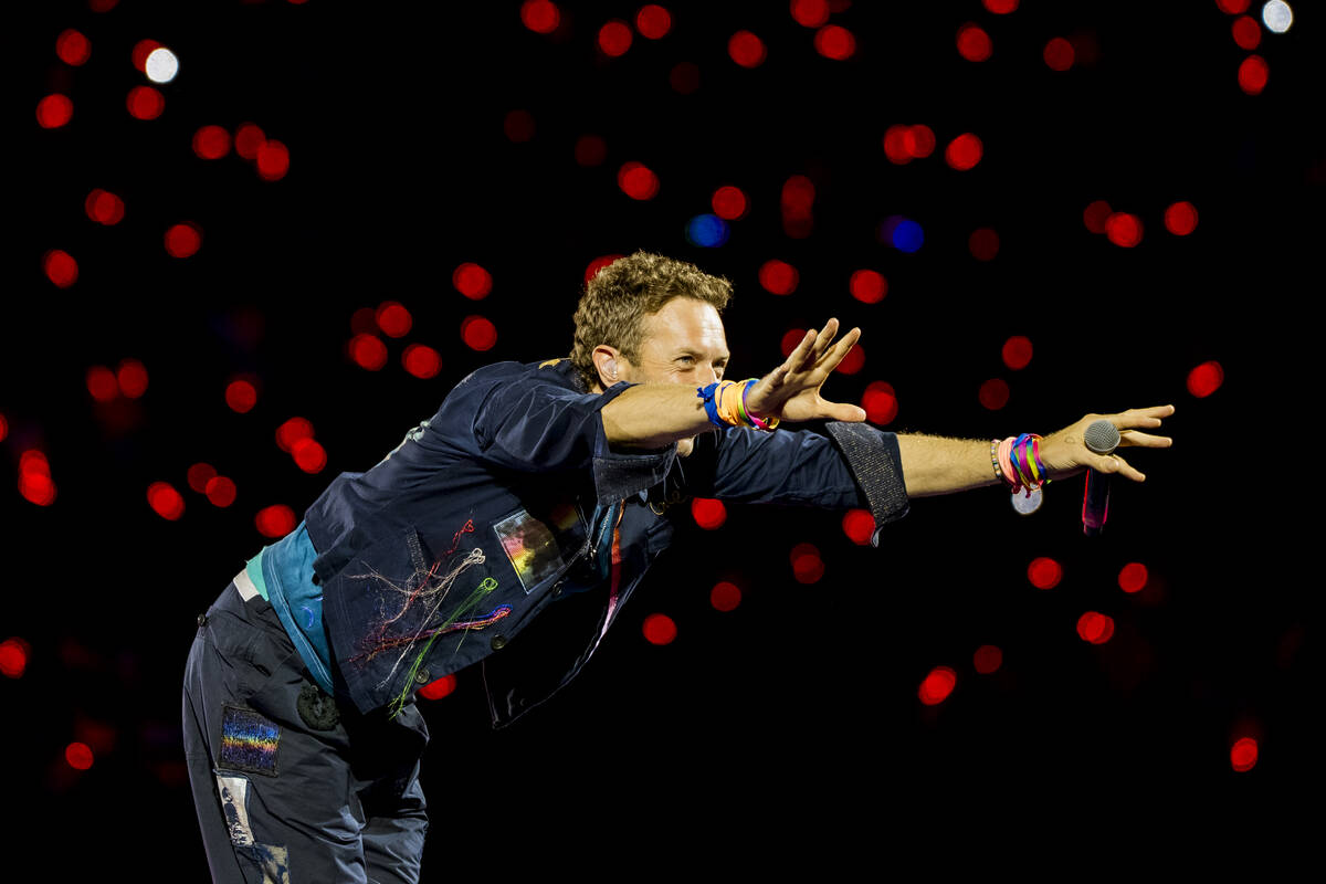Chris Martin of Coldplay is shown during the "Music of the Spheres" tour stop at Allegiant Stad ...