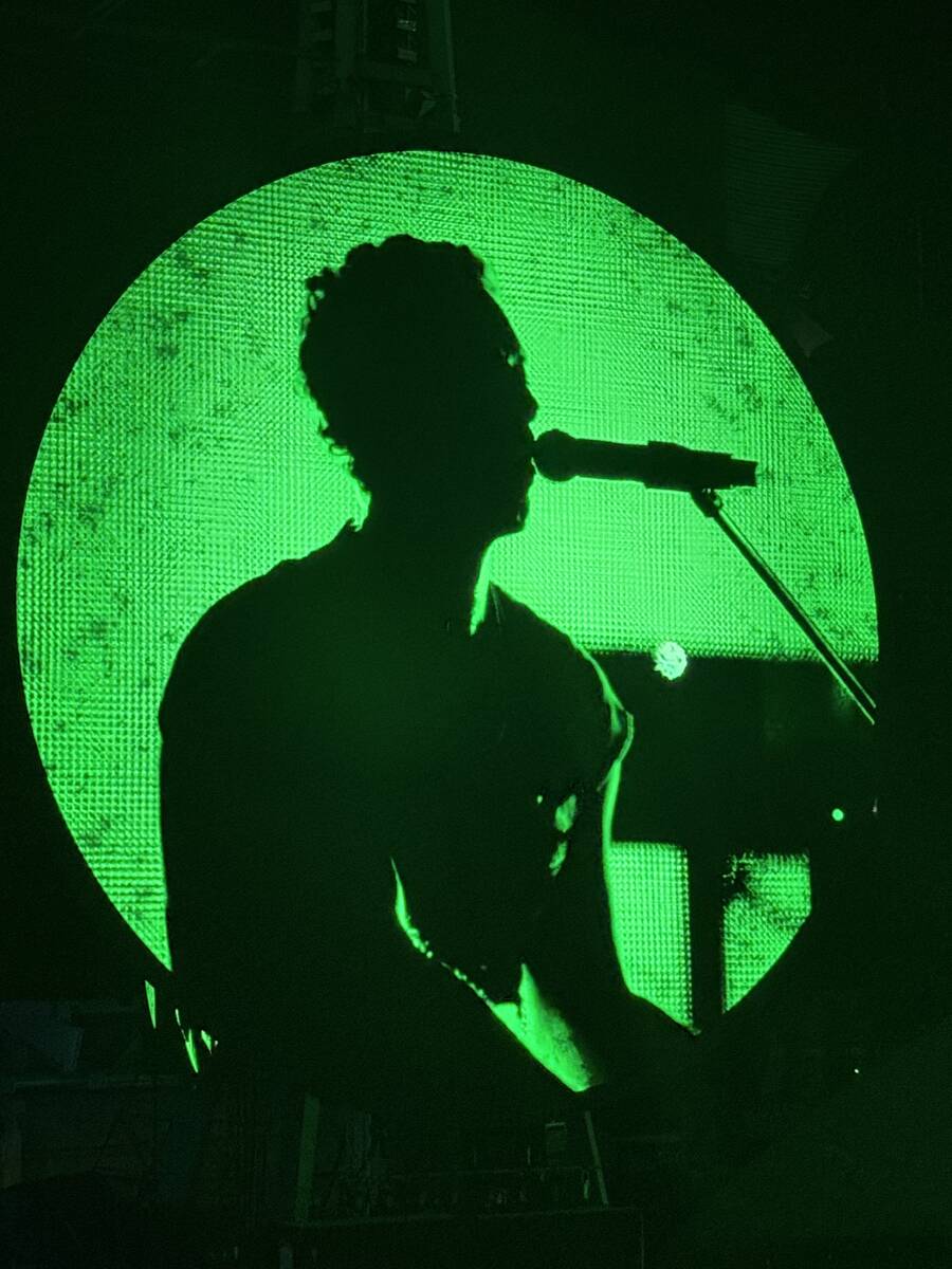 Chris Martin of Coldplay is shown during the "Music of the Spheres" tour stop at Allegiant Stad ...