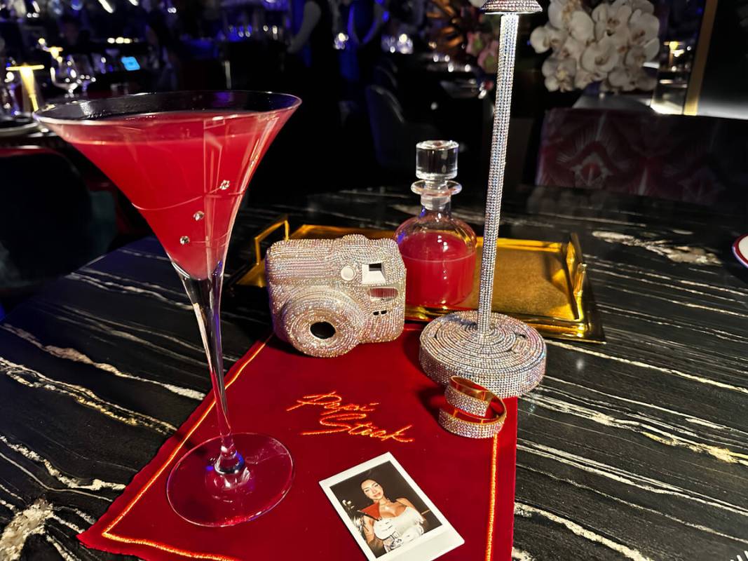 A Papirazzi cocktail at Papi Steak in the Fontainebleau on the Las Vegas Strip comes with a bed ...